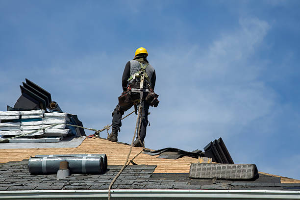 Professional Gutter Installation technician working in Garrison, MD